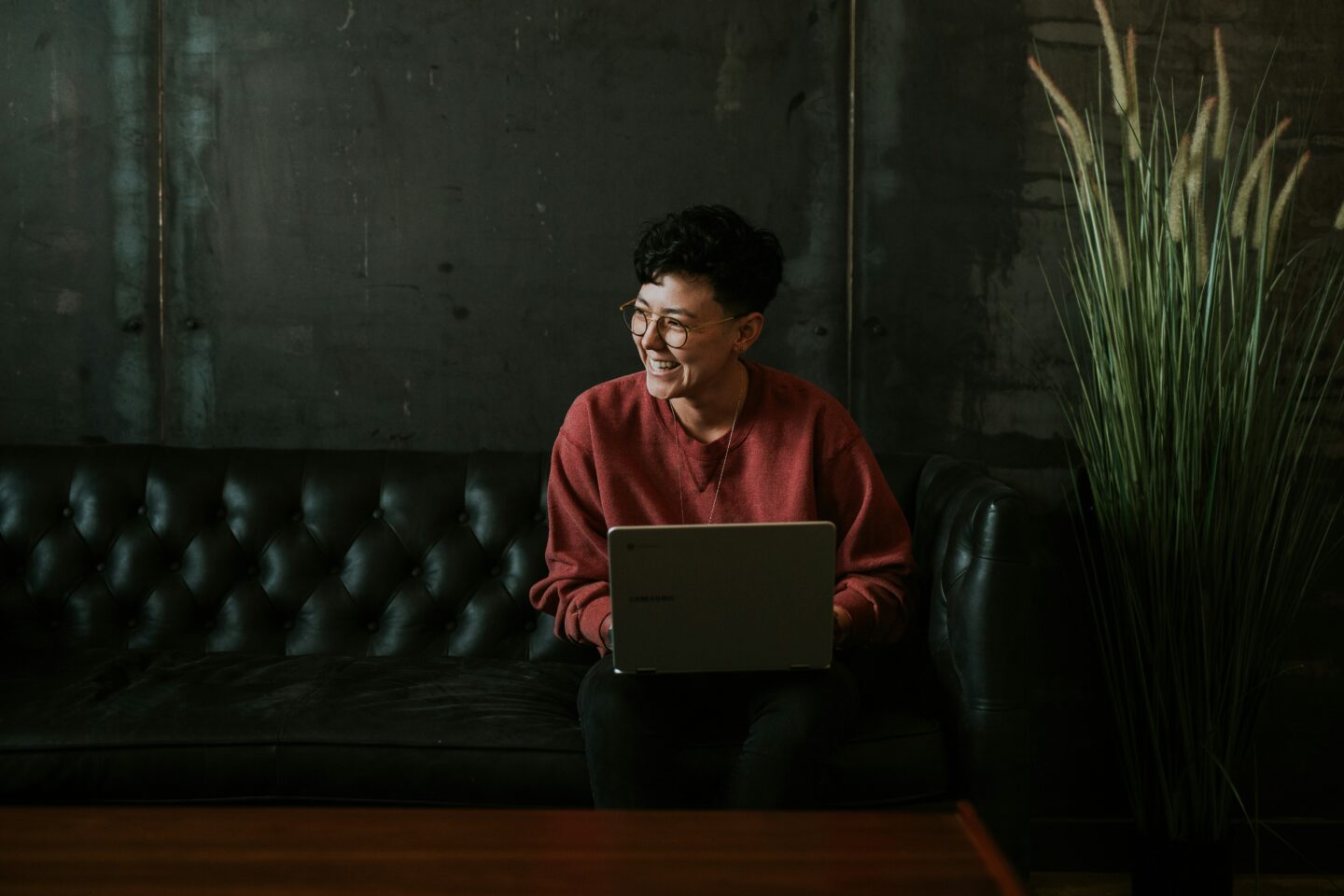 Young entrepreneur working on her website to promote her services 